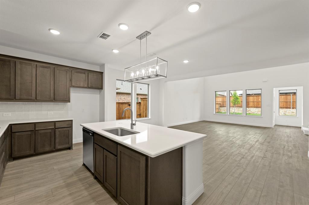 1443 Canadian Lane Van Alstyne, TX 75495 - Photo 6 of 27 08. 1443 Canadian - Kitchen (3)