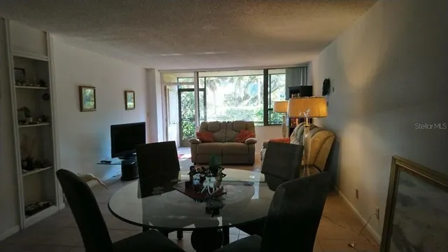 a work room with furniture and a window