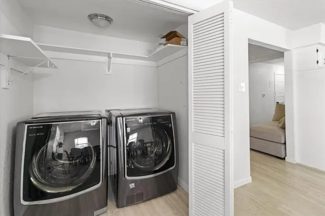 a utility room with a washer and dryer