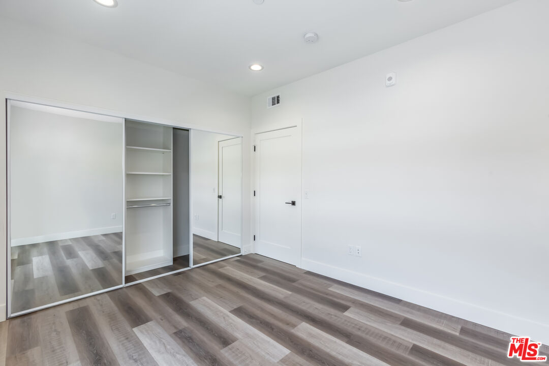 857 North Hayworth Avenue, Unit 403 Los Angeles, CA 90046 - Photo 18 of 52 a view of an empty room