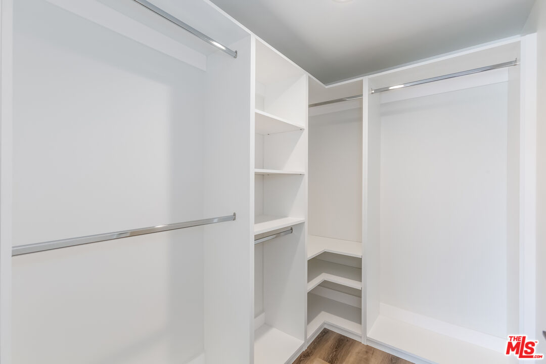 857 North Hayworth Avenue, Unit 403 Los Angeles, CA 90046 - Photo 38 of 52 a view of an empty walk in closet
