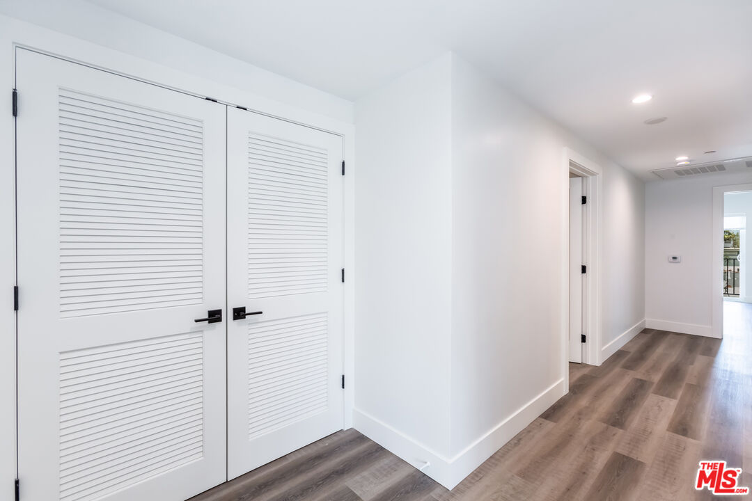 857 North Hayworth Avenue, Unit 403 Los Angeles, CA 90046 - Photo 41 of 52 wooden floor in an empty room