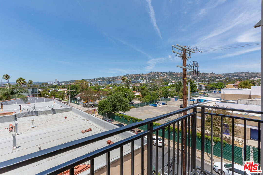 857 North Hayworth Avenue, Unit 403 Los Angeles, CA 90046 - Photo 44 of 52 a view of a city from a balcony
