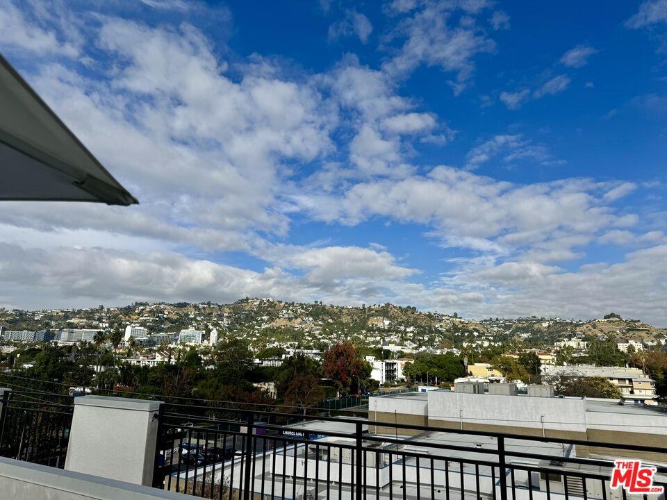 857 North Hayworth Avenue, Unit 403 Los Angeles, CA 90046 - Photo 48 of 52 a view of city and mountain
