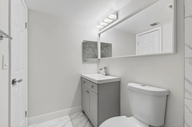 a view of pool with a car parked