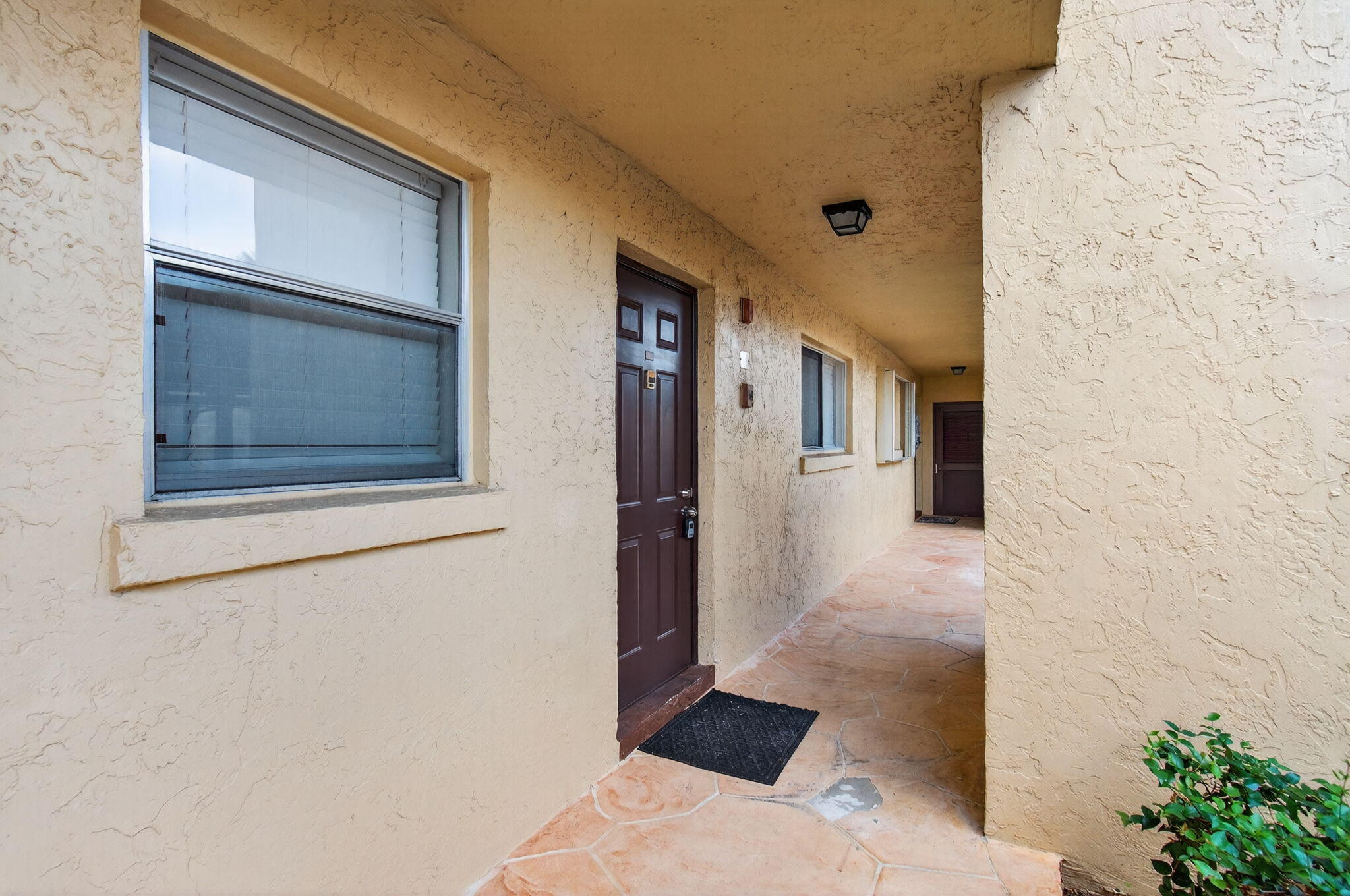 2975 Southwest 22nd Avenue, Unit 1070 Delray Beach, FL 33445 - Photo 48 of 60 a picture of a bathroom with a sink and mirror