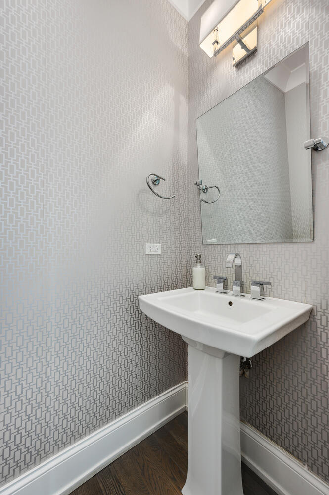 113 West Elm Street Chicago, IL 60610 - Photo 11 of 30 a close up of a sink and a mirror