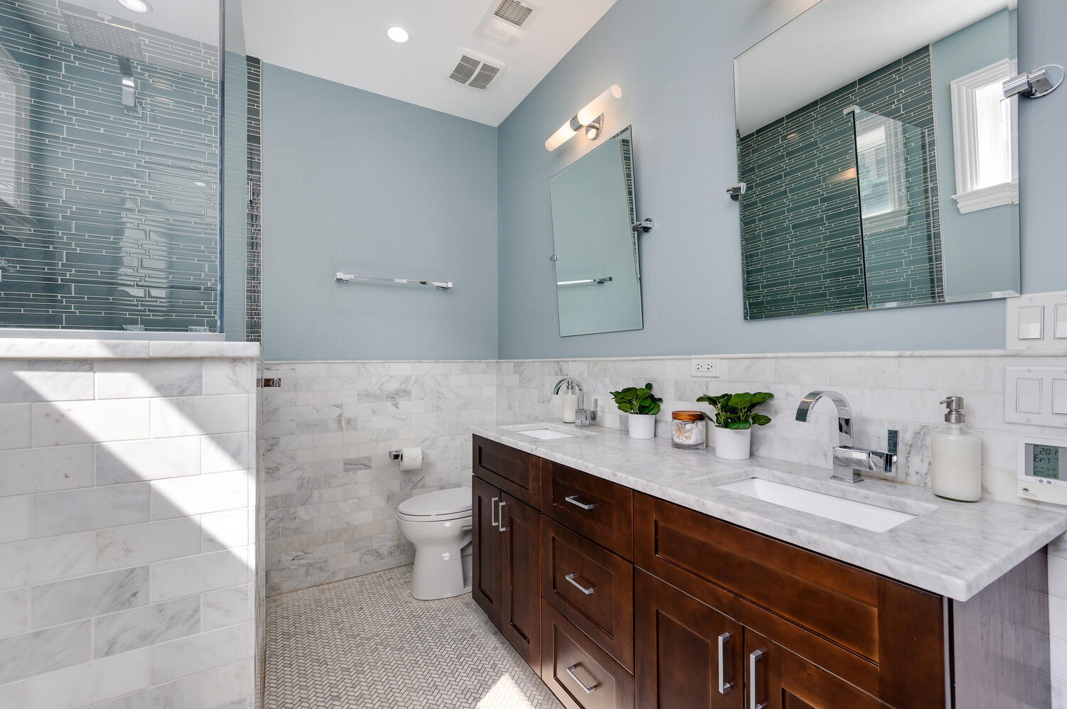 113 West Elm Street Chicago, IL 60610 - Photo 14 of 30 a bathroom with a sink double vanity and a mirror