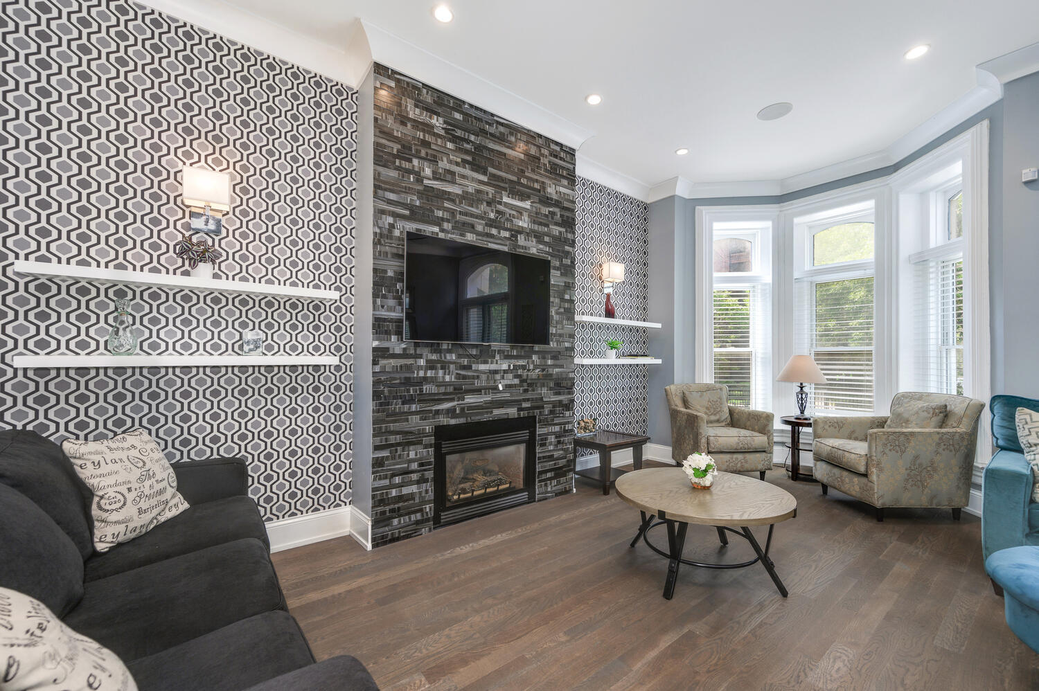 113 West Elm Street Chicago, IL 60610 - Photo 2 of 30 a living room with furniture a fireplace and a flat screen tv