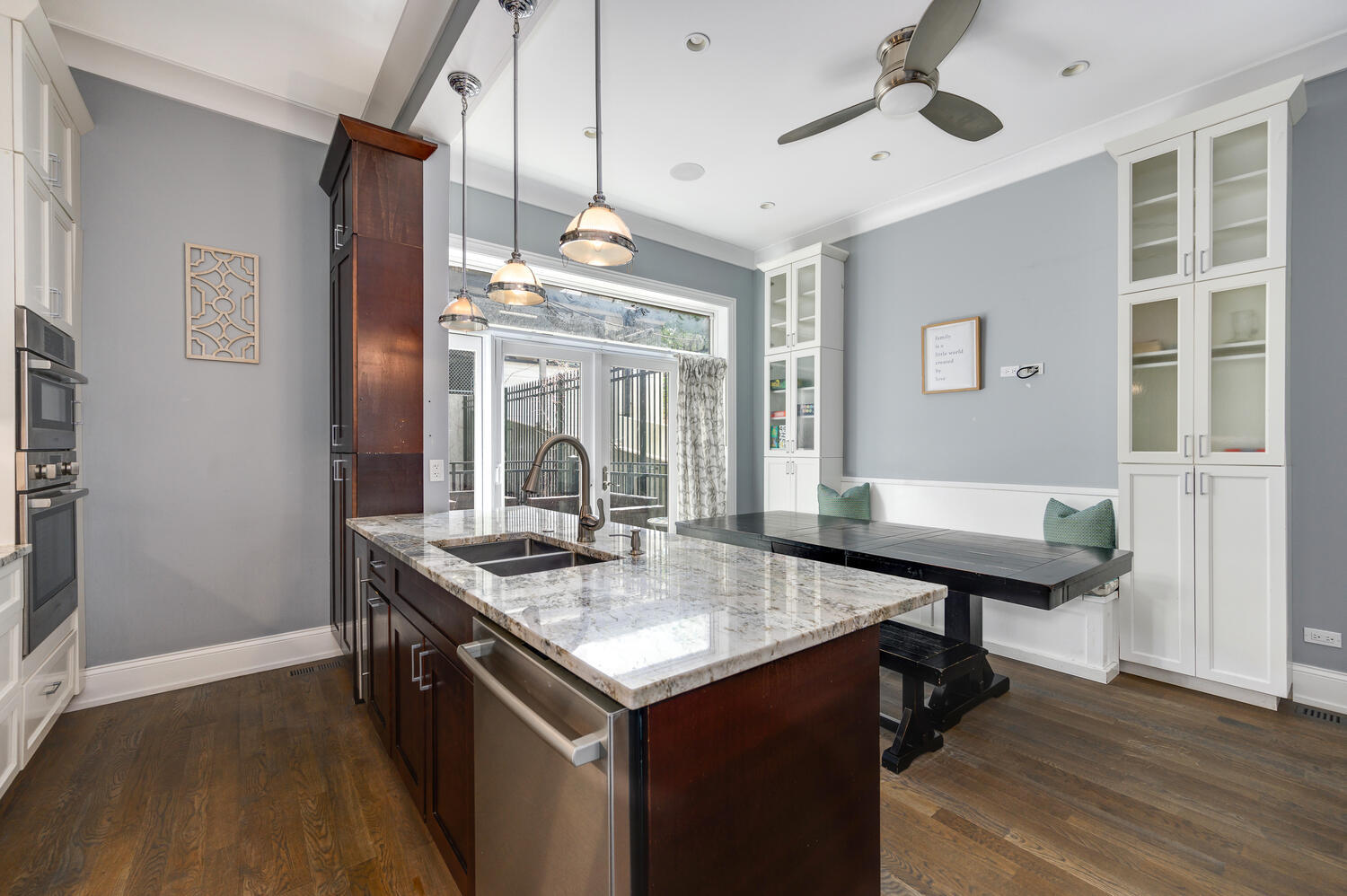 113 West Elm Street Chicago, IL 60610 - Photo 6 of 30 a kitchen with a counter space and wooden floor