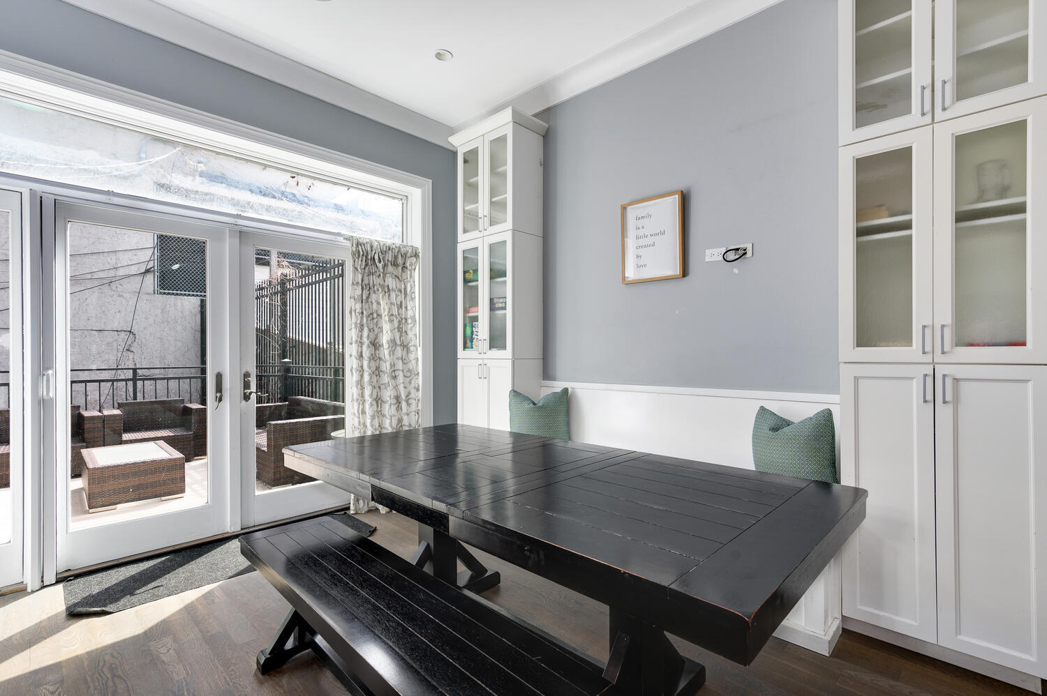 113 West Elm Street Chicago, IL 60610 - Photo 9 of 30 a living room with a table and glass door