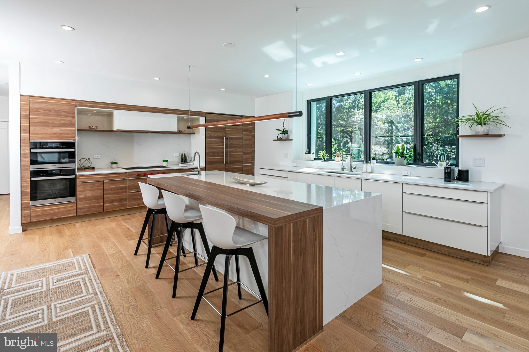 44 Armour Road Princeton, NJ 08540 - Photo 11 of 51 a kitchen with a table chairs sink and cabinets