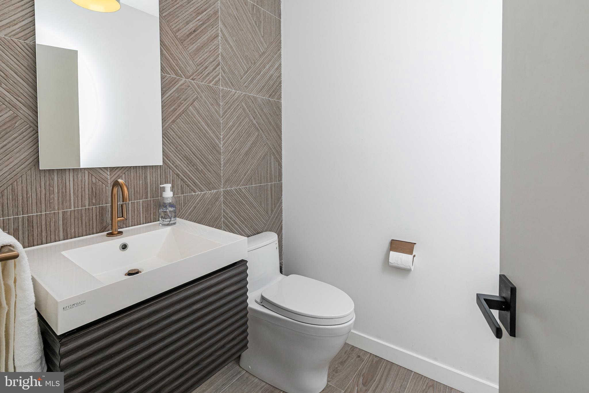 44 Armour Road Princeton, NJ 08540 - Photo 17 of 51 a bathroom with a sink a toilet and mirror