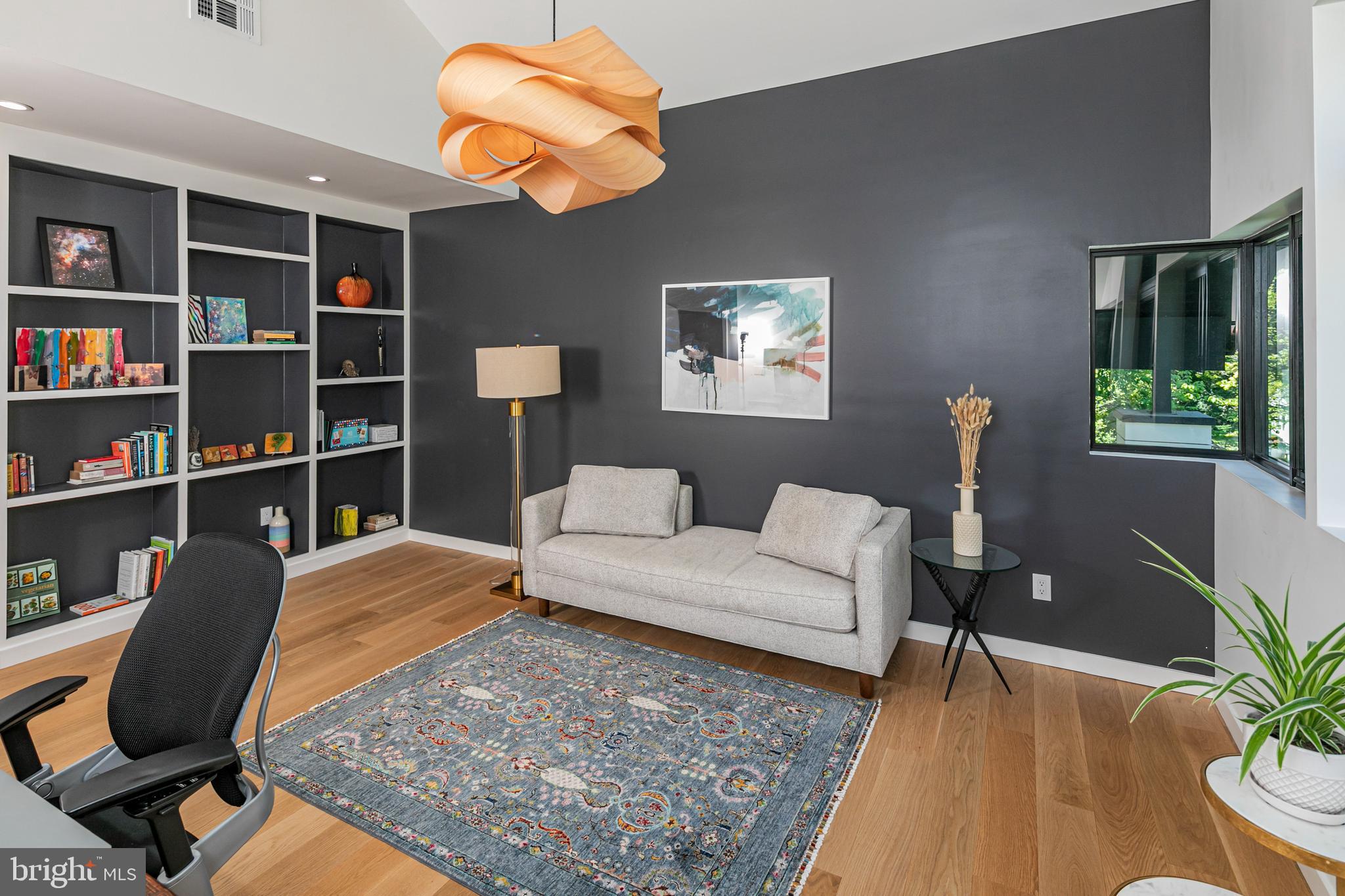 44 Armour Road Princeton, NJ 08540 - Photo 22 of 51 a living room with furniture and a book shelf