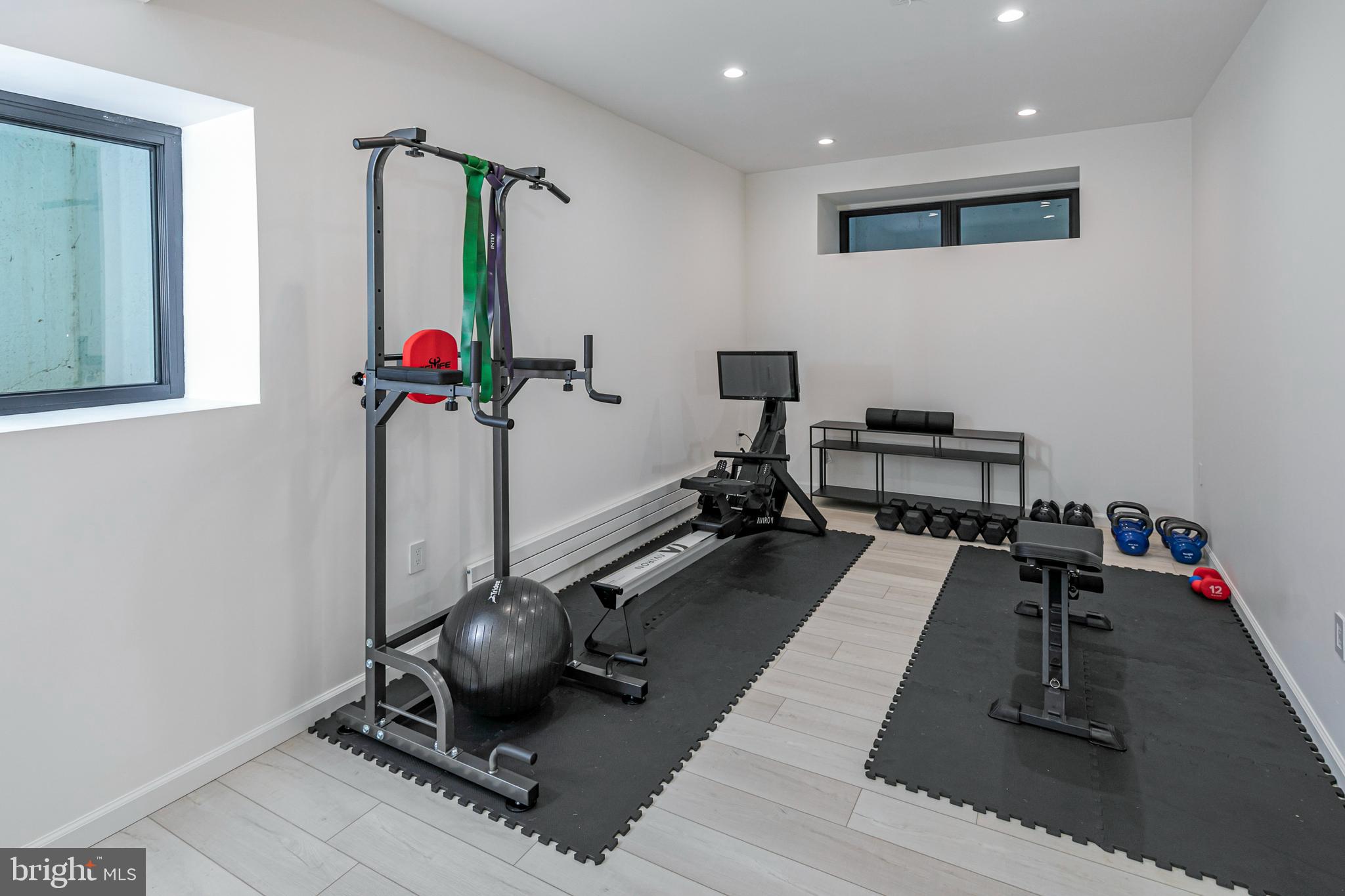 44 Armour Road Princeton, NJ 08540 - Photo 38 of 51 a room with gym equipment and a table
