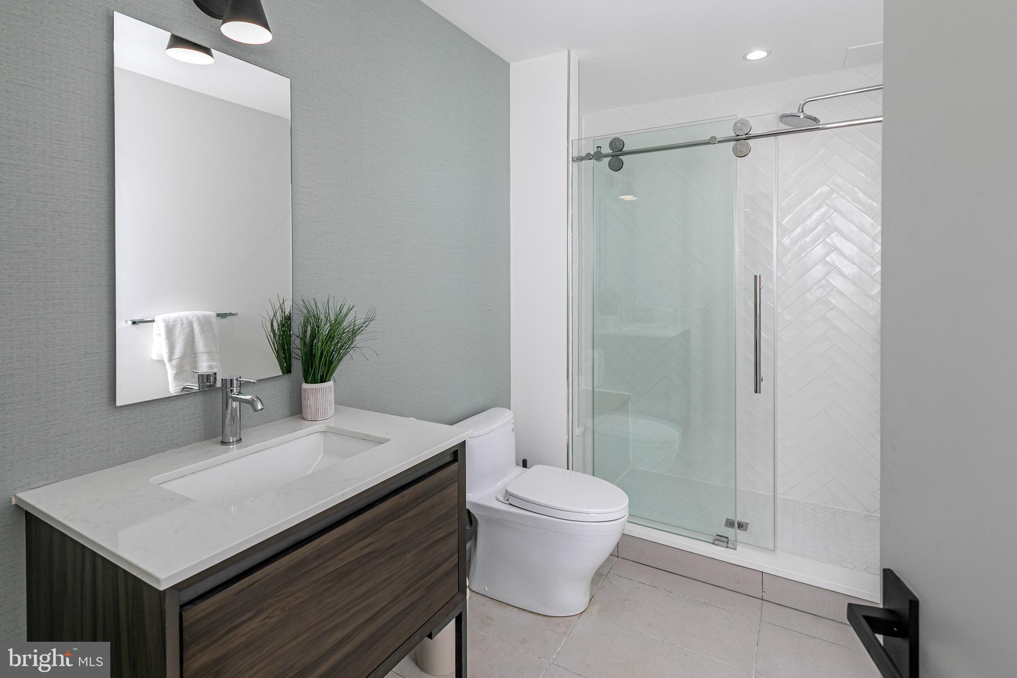 44 Armour Road Princeton, NJ 08540 - Photo 39 of 51 a bathroom with a sink a toilet and shower