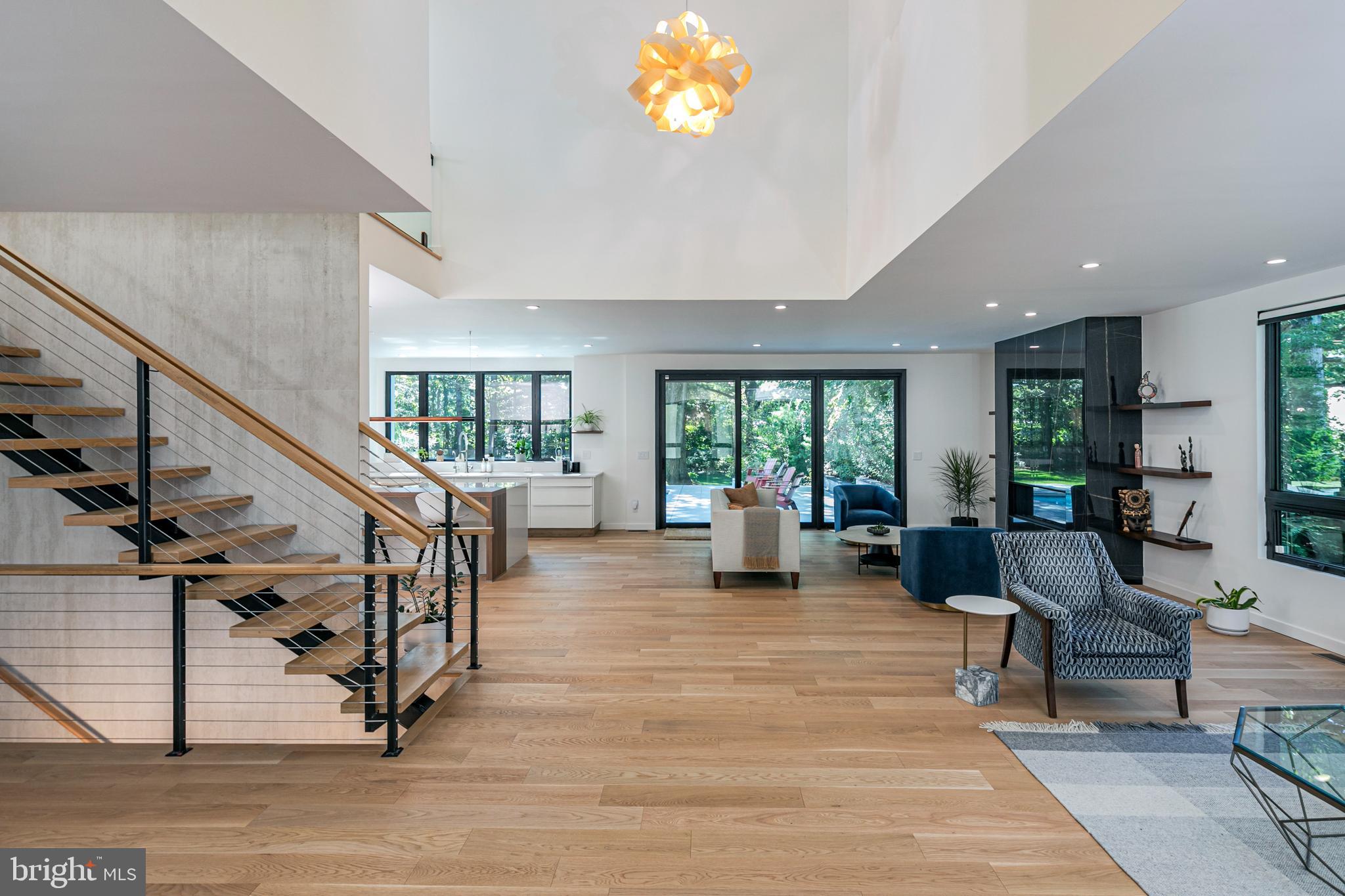44 Armour Road Princeton, NJ 08540 - Photo 4 of 51 a living room with furniture and a dining table with wooden floor