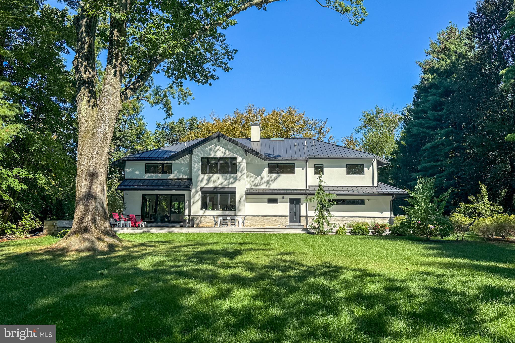 44 Armour Road Princeton, NJ 08540 - Photo 46 of 51 a view of a house with a big yard and large trees