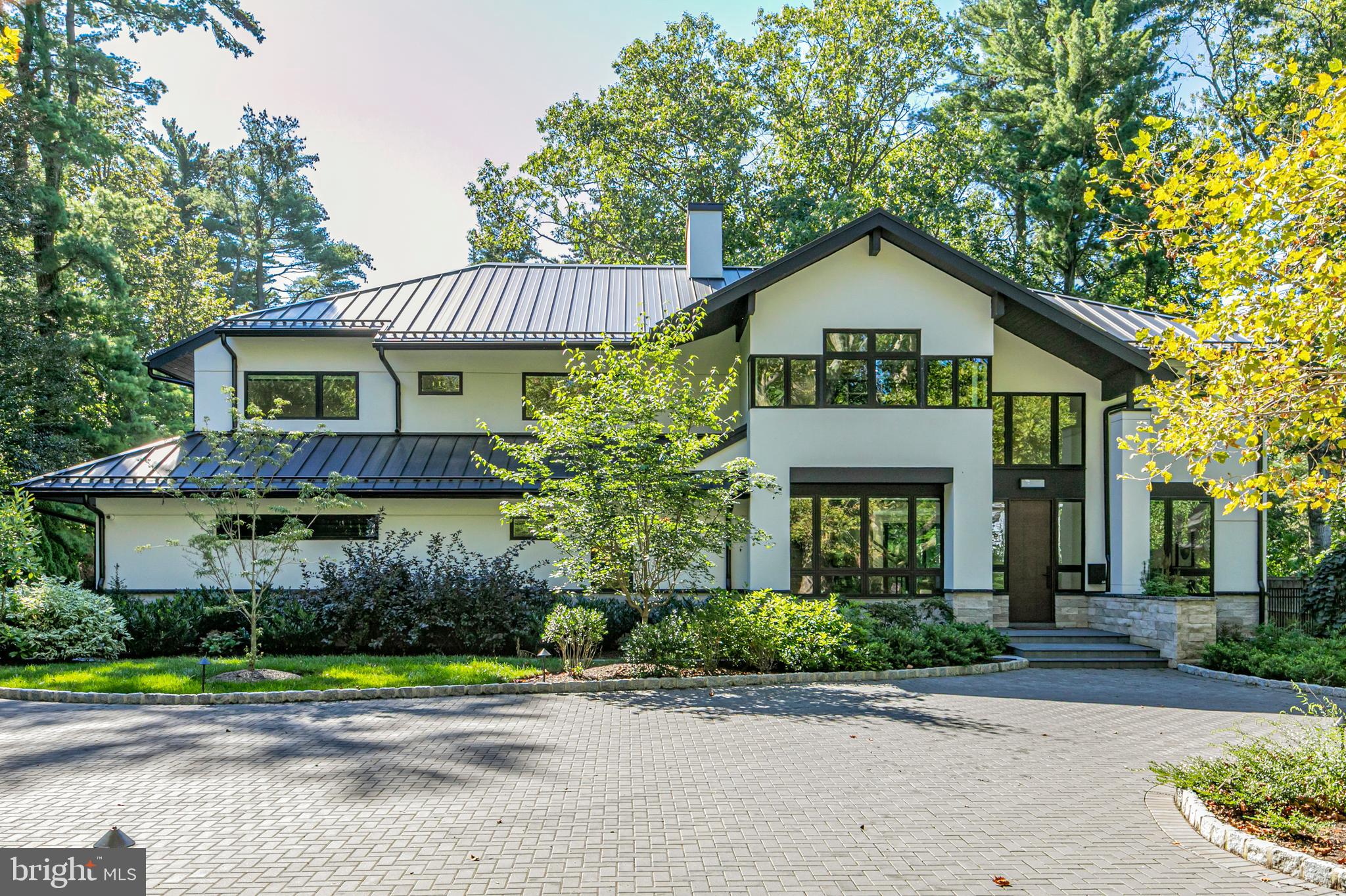 44 Armour Road Princeton, NJ 08540 - Photo 48 of 51 a view of a house with a yard and plants