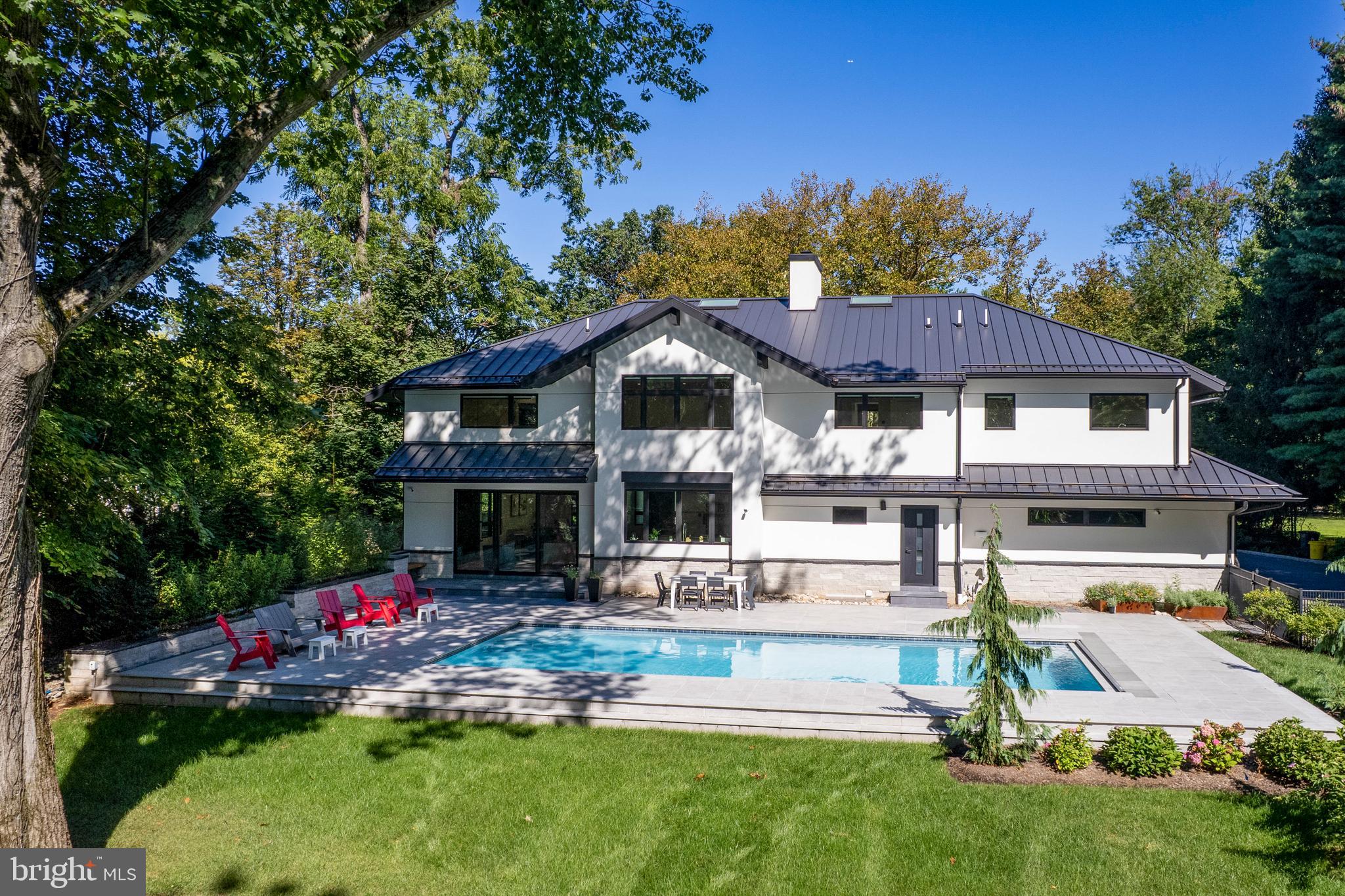 44 Armour Road Princeton, NJ 08540 - Photo 49 of 51 a front view of a house with a yard and swimming pool