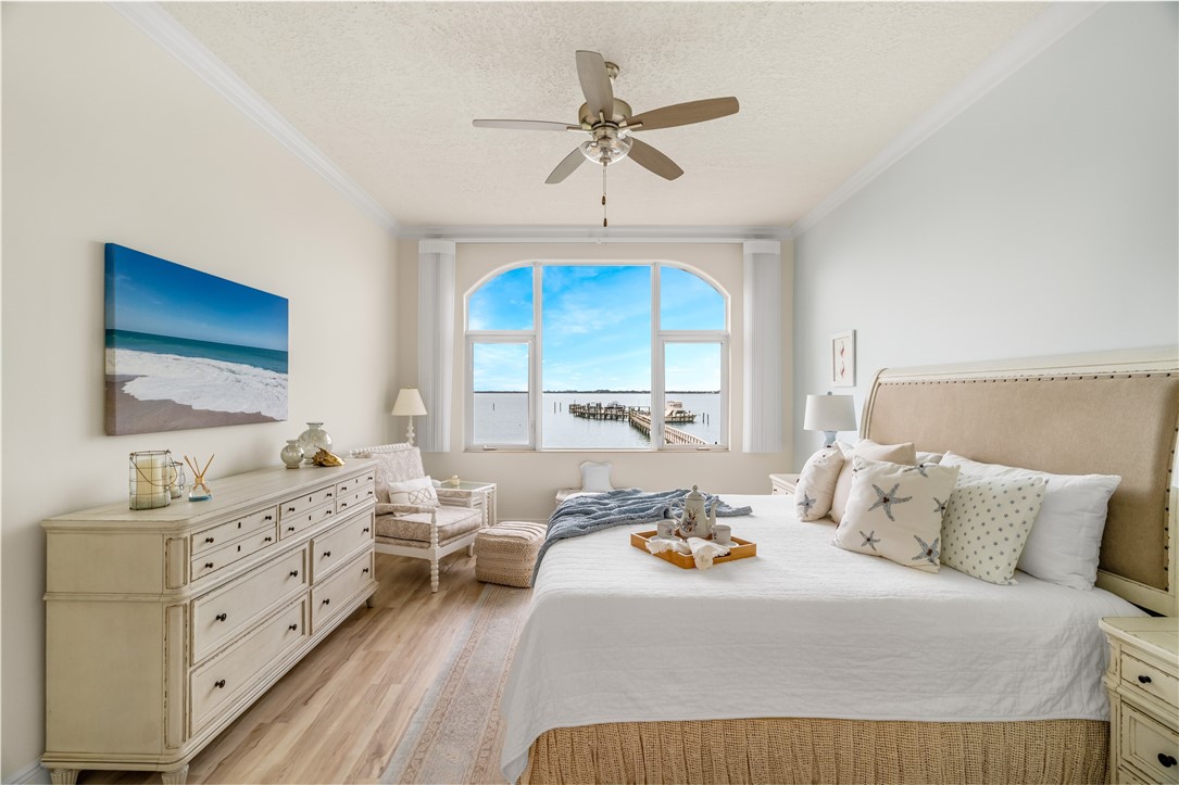 1701 Gulfstream Avenue, Unit 729 Fort Pierce, FL 34949 - Photo 15 of 36 a bedroom with a bed and a window