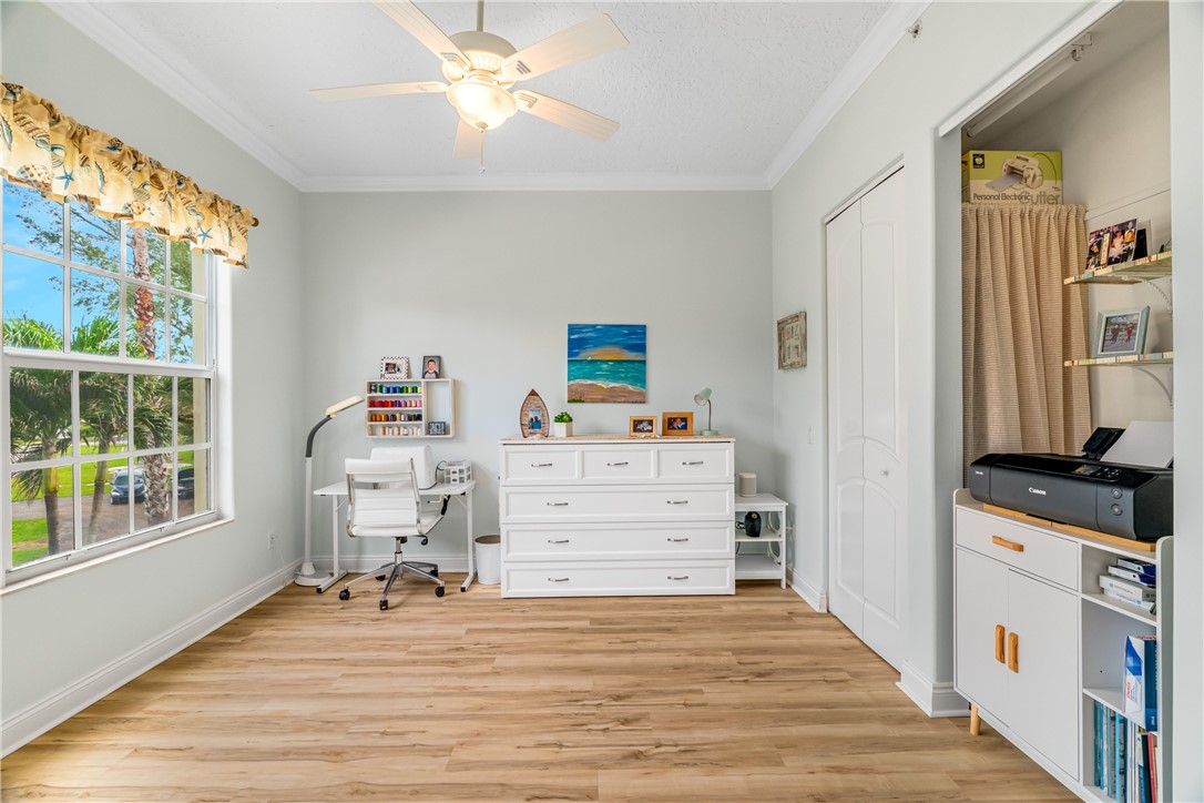 1701 Gulfstream Avenue, Unit 729 Fort Pierce, FL 34949 - Photo 24 of 36 a view of a bedroom with furniture and windows