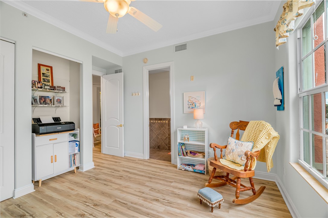 1701 Gulfstream Avenue, Unit 729 Fort Pierce, FL 34949 - Photo 25 of 36 a view of a workspace with furniture and a window