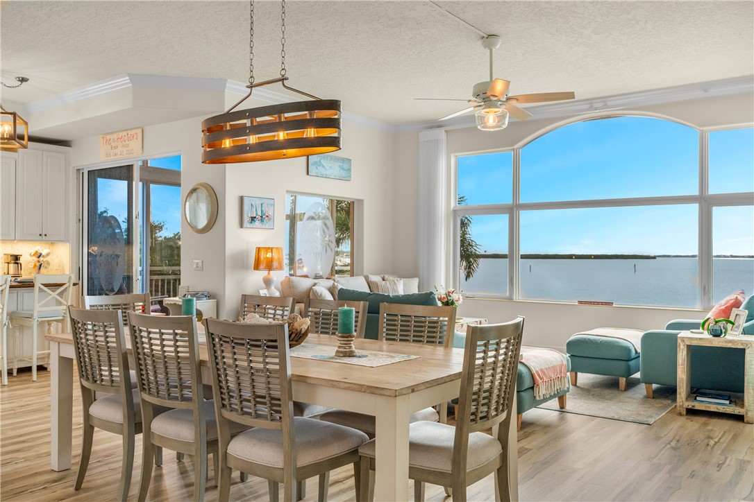 1701 Gulfstream Avenue, Unit 729 Fort Pierce, FL 34949 - Photo 9 of 36 a view of a dining room with furniture window and outside view