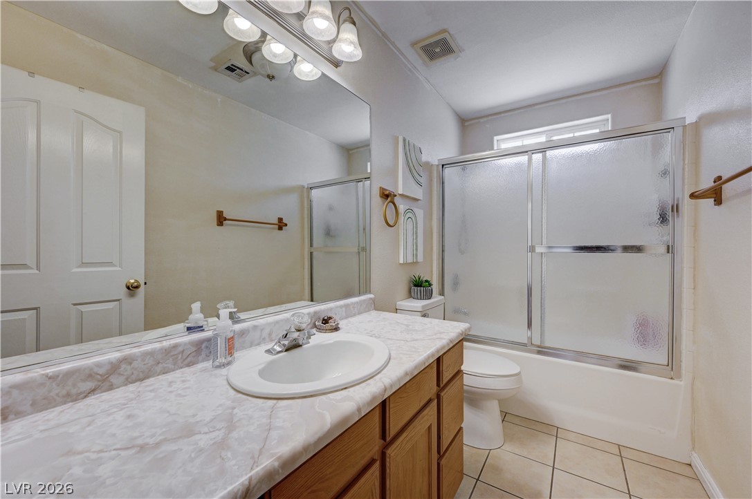 1272 Liston Avenue Logandale, NV 89021 - Photo 32 of 61 Functional bathroom features a spacious vanity and a combination tub and shower for everyday convenience.