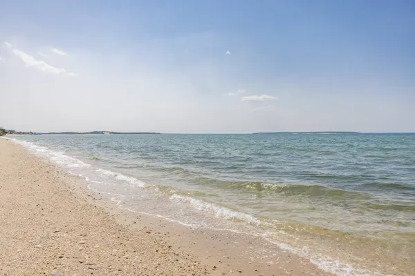 a view of beach and ocean