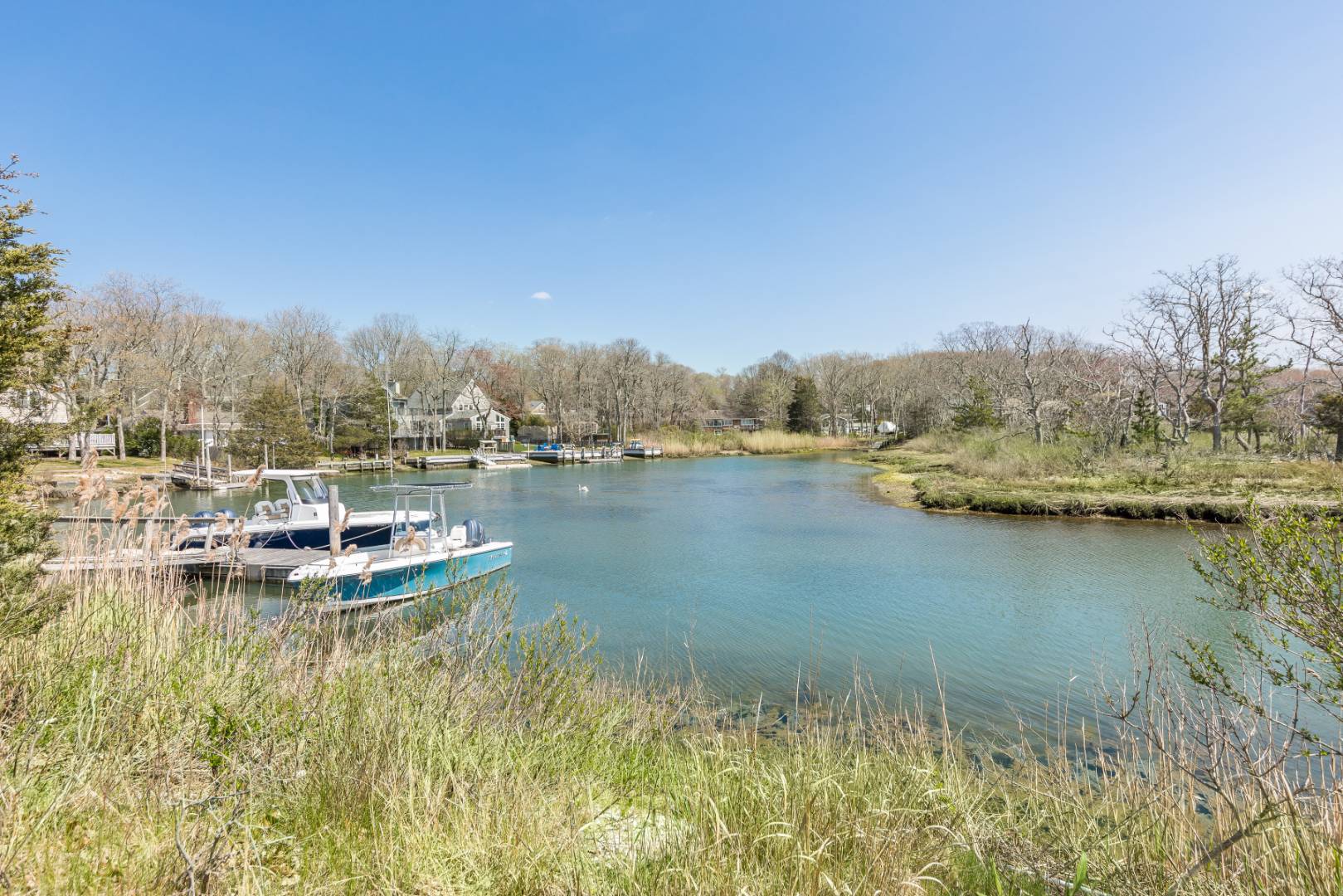 2 Bayview Road Southampton, NY 11968 - Photo 17 of 17 a view of a lake with trees in the background