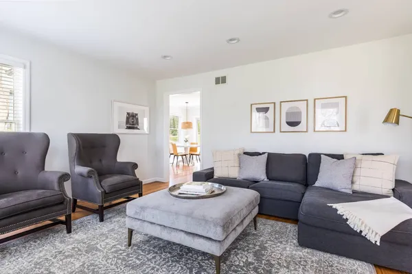 a living room with furniture and a couch