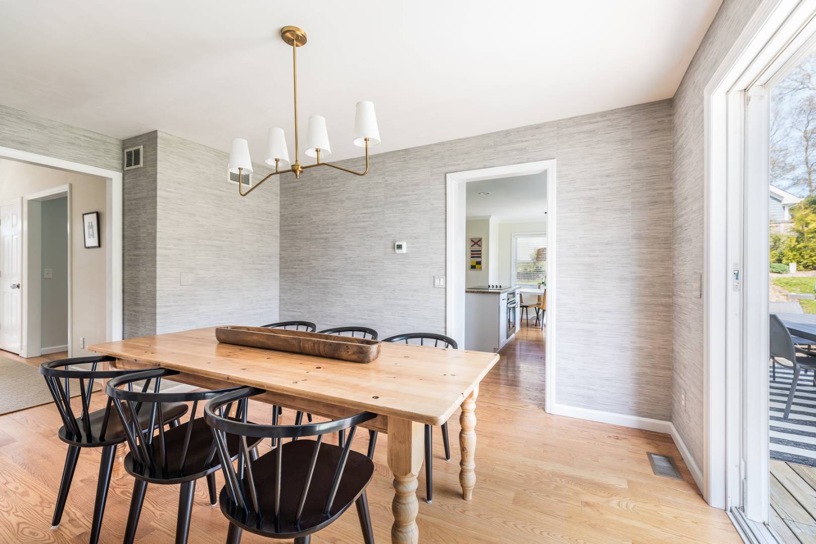 2 Bayview Road Southampton, NY 11968 - Photo 4 of 17 a view of a dining table and chairs in a room