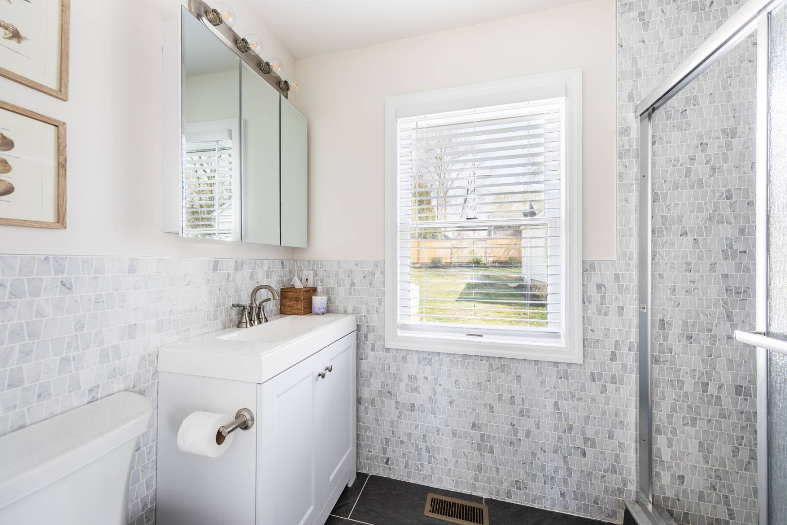 2 Bayview Road Southampton, NY 11968 - Photo 10 of 17 a bathroom with a sink a toilet and a bathtub