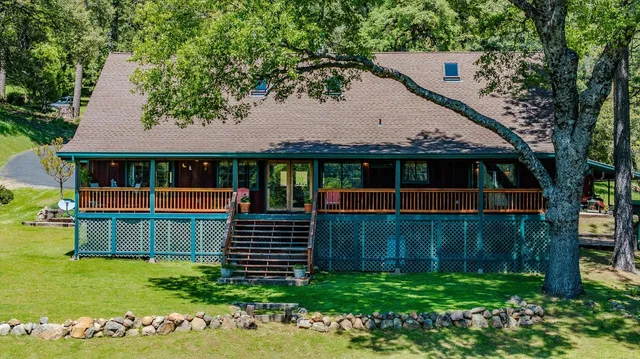 a view of a lake with a big yard