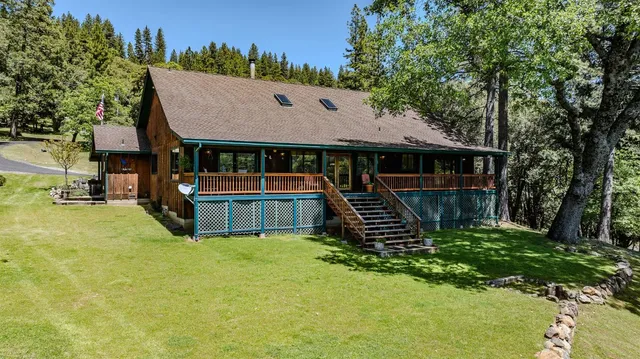 a view of a lake with a big yard