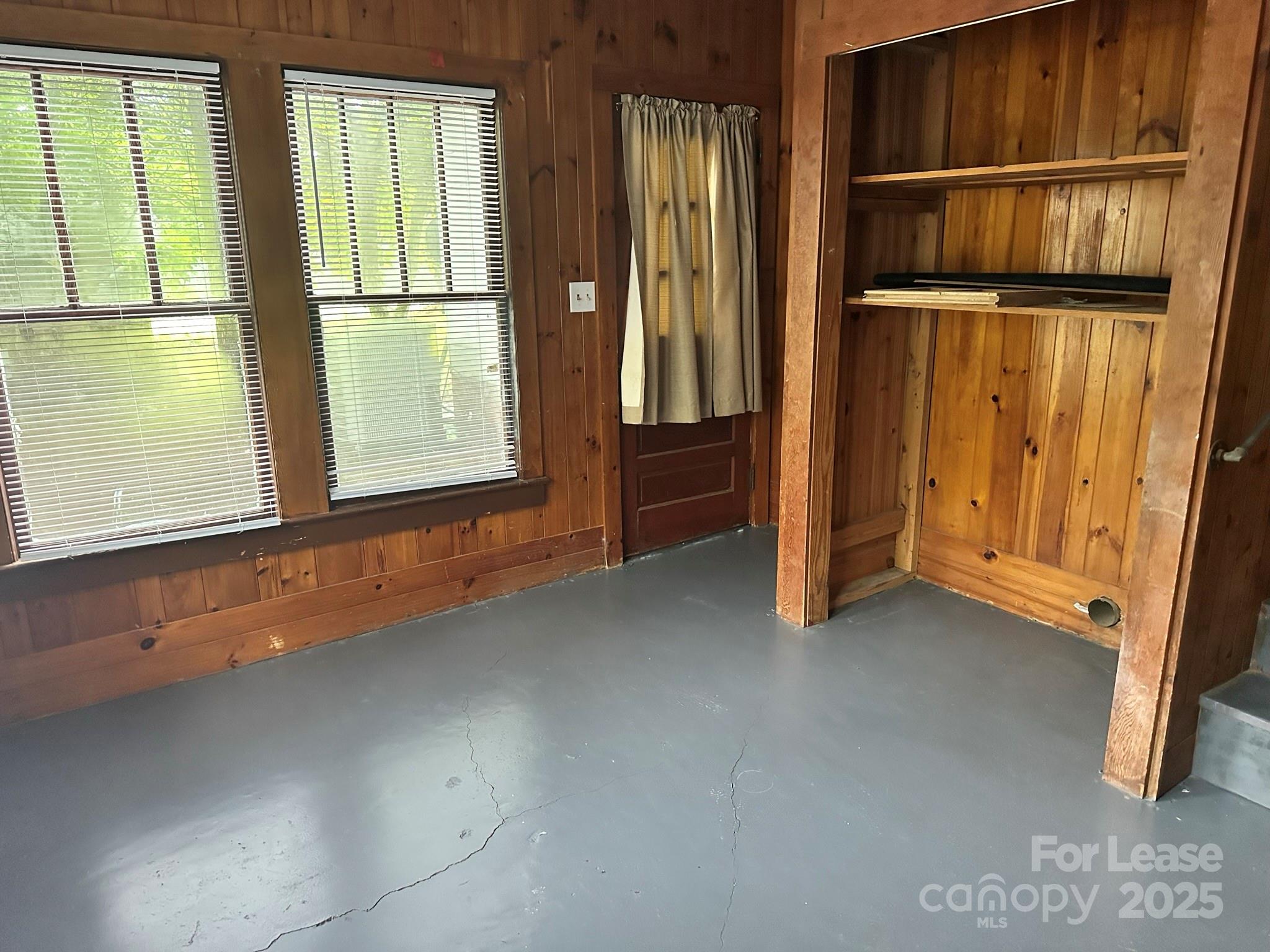 9155 601st Highway Midland, NC 28107 - Photo 11 of 14 a view of an empty room with a window