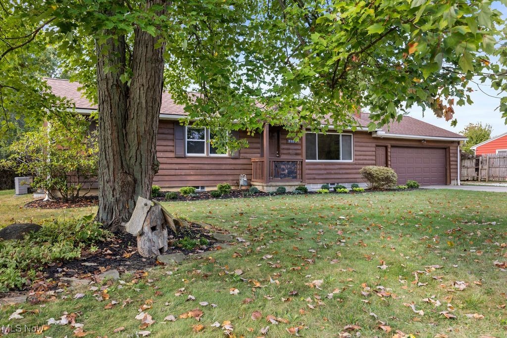 5956 Ryan Road Medina, OH 44256 - Photo 26 of 27 Single story home featuring a front yard, driveway, an attached garage, and roof with shingles