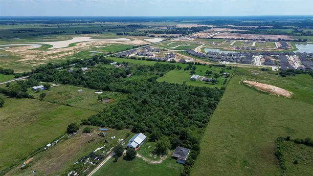 a view of a city with a lake