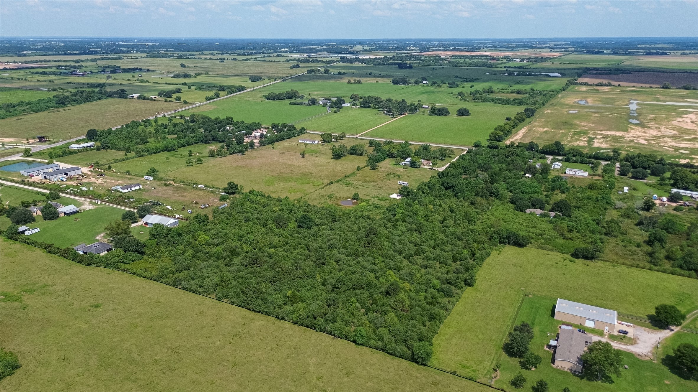 0 Knebel Road Waller, TX 77484 - Photo 17 of 36 a view of a lush green field