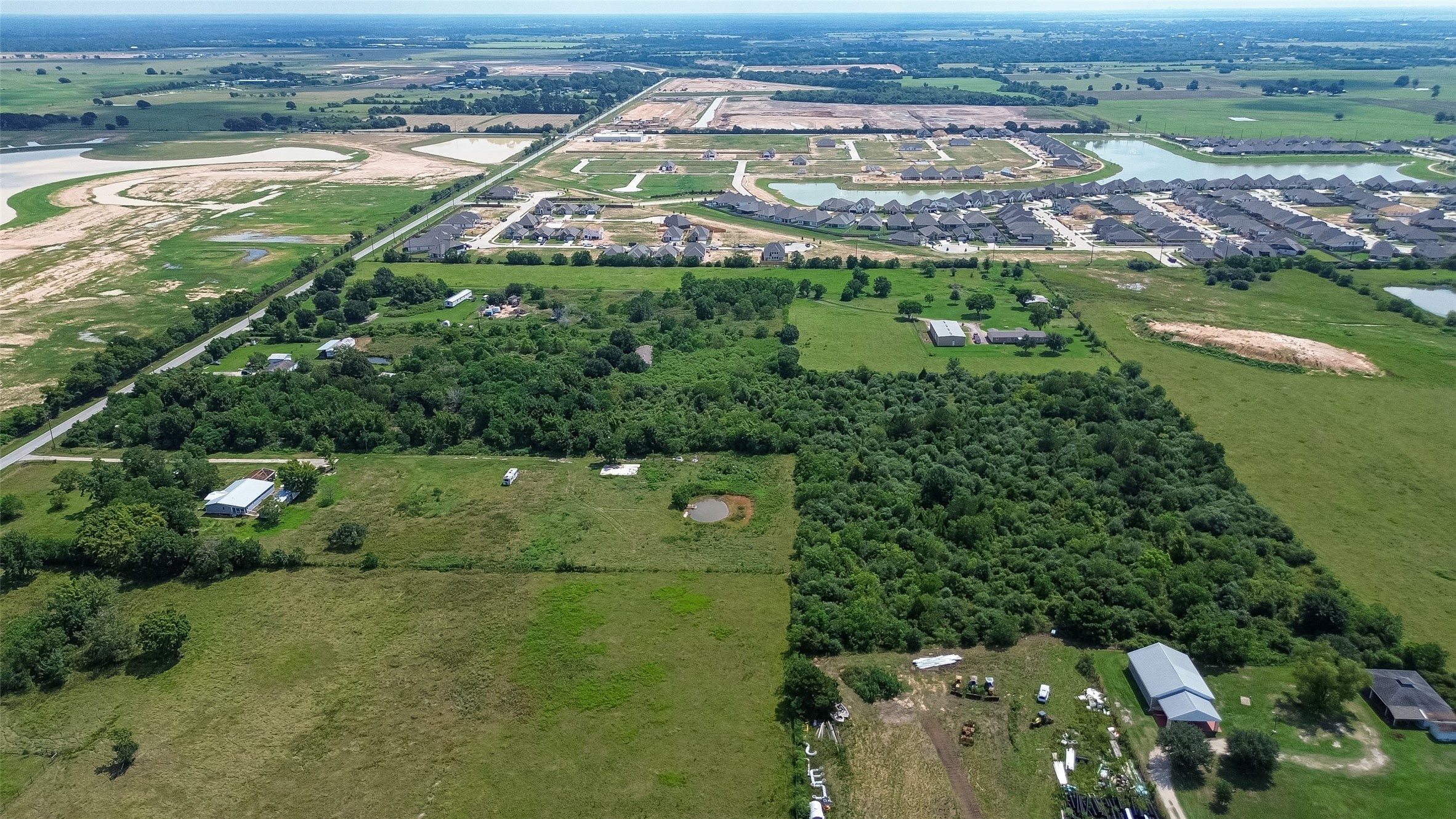 0 Knebel Road Waller, TX 77484 - Photo 22 of 36 an aerial view of a residential houses with outdoor space