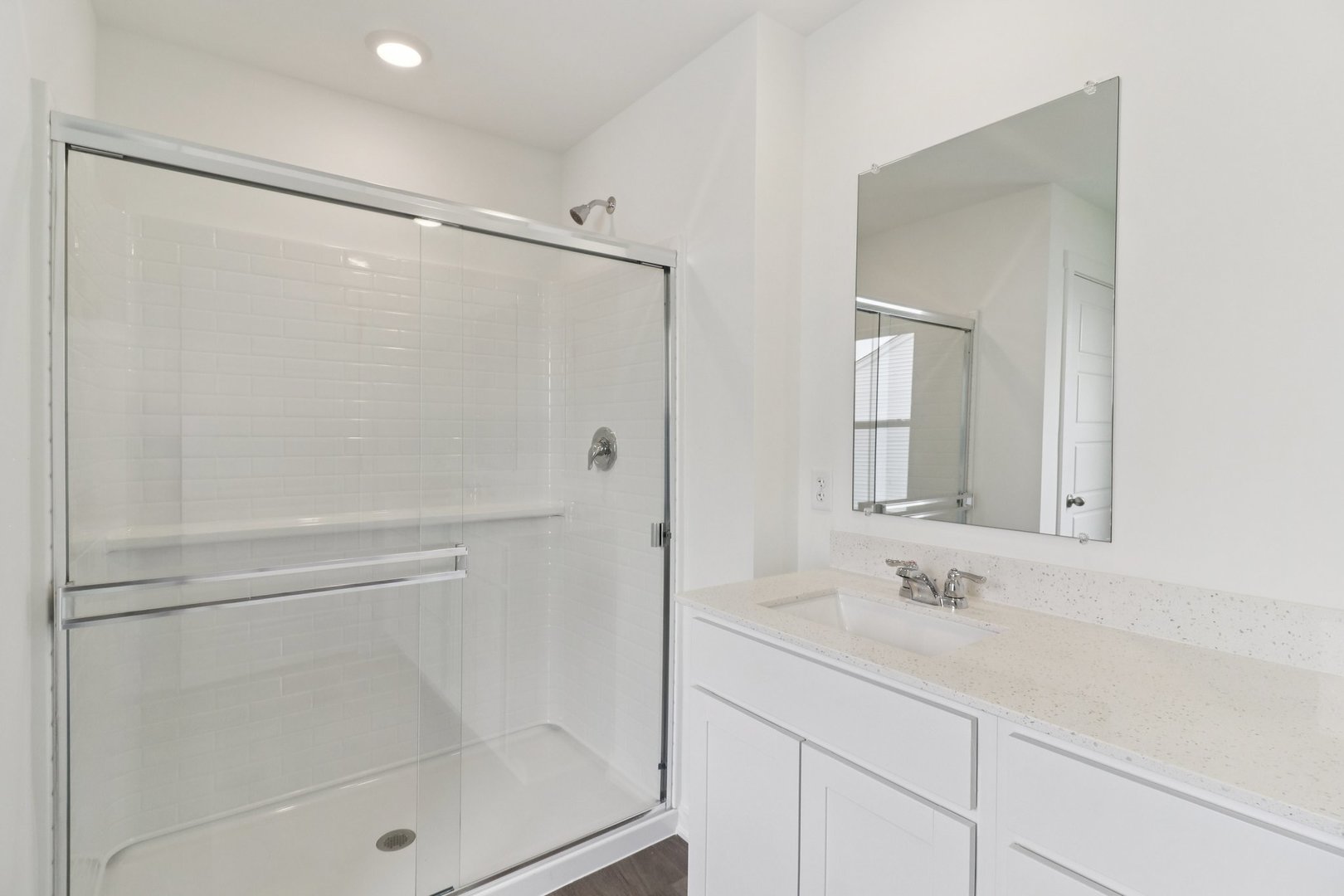 9956 Edgebrook Lane Huntley, IL 60142 - Photo 21 of 29 a bathroom with a shower sink and mirror