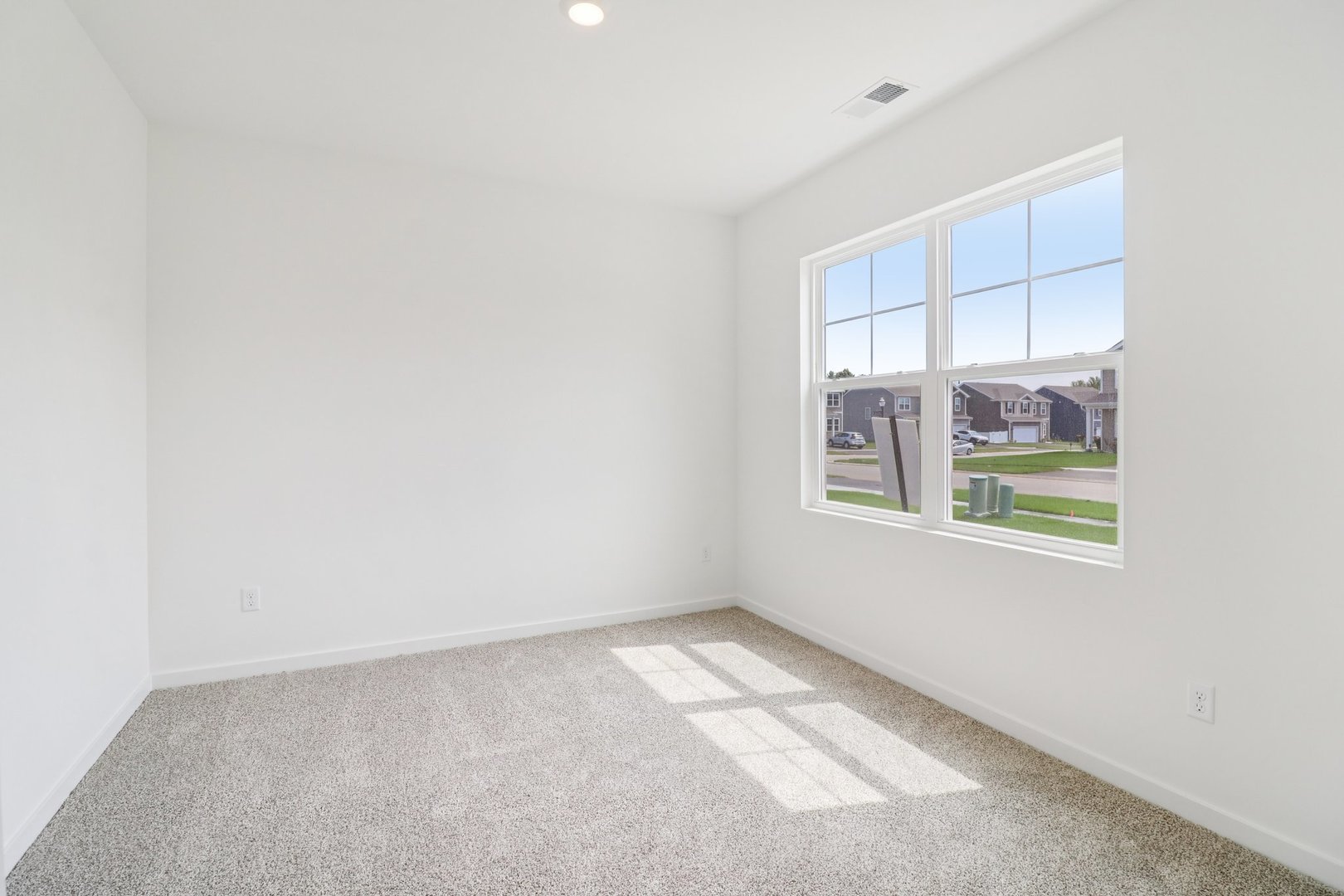 9956 Edgebrook Lane Huntley, IL 60142 - Photo 4 of 29 an empty room with windows