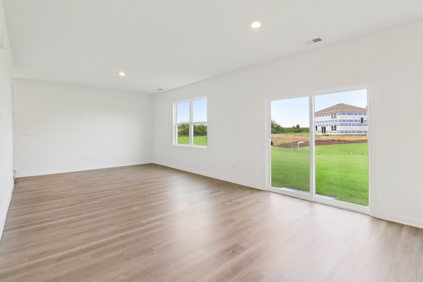 9956 Edgebrook Lane Huntley, IL 60142 - Photo 5 of 29 a view of an empty room with a window