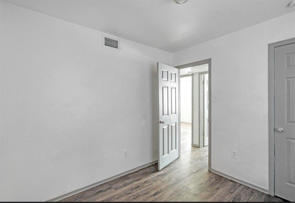 916 Isbell Road, Unit D Fort Worth, TX 76114 - Photo 11 of 13 a view of an empty room