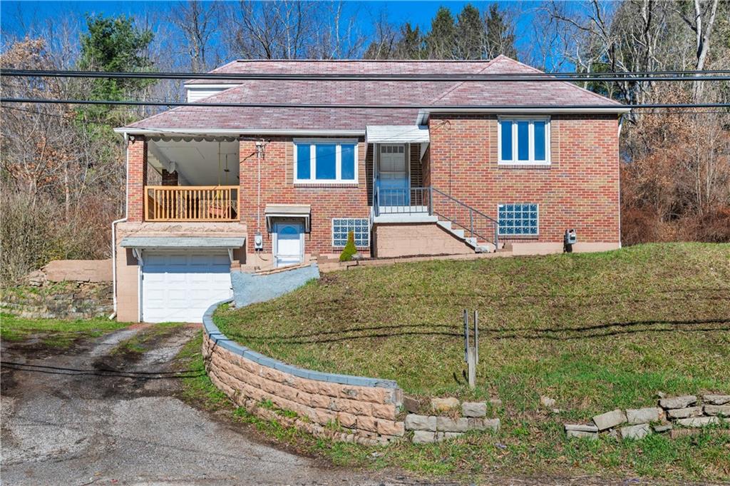 7510 Noblestown Road McDonald, PA 15057 - Photo 1 of 20 a view of a house with a yard
