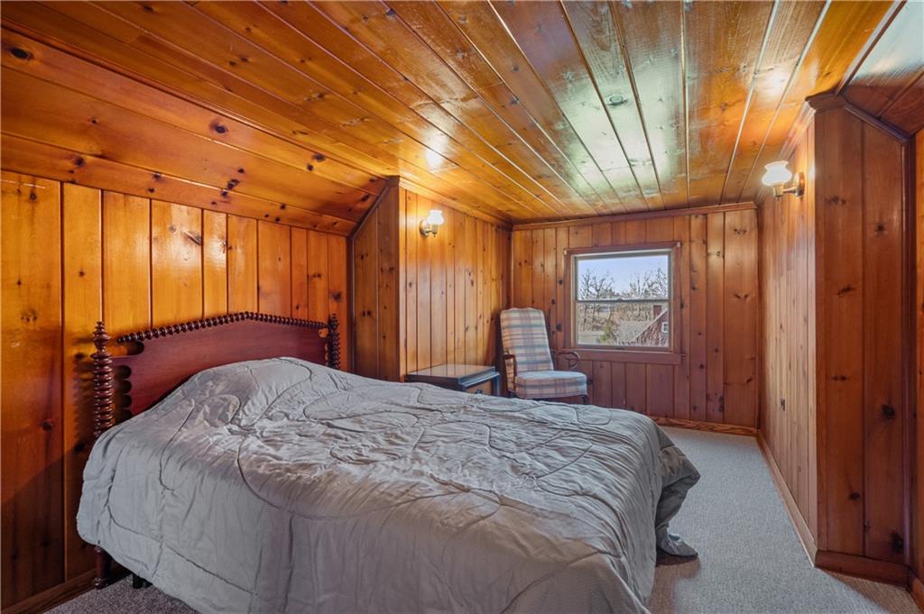 7510 Noblestown Road McDonald, PA 15057 - Photo 11 of 20 a bedroom with a bed a mirror and a desk