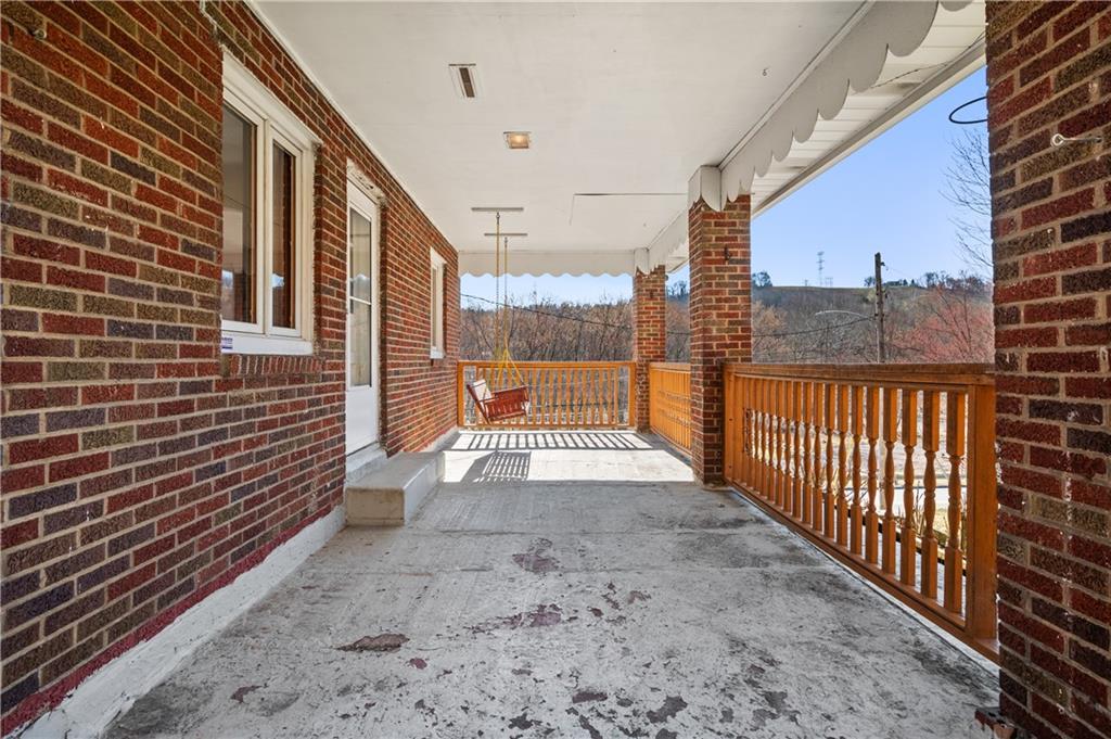7510 Noblestown Road McDonald, PA 15057 - Photo 15 of 20 a view of a balcony with a floor to ceiling window