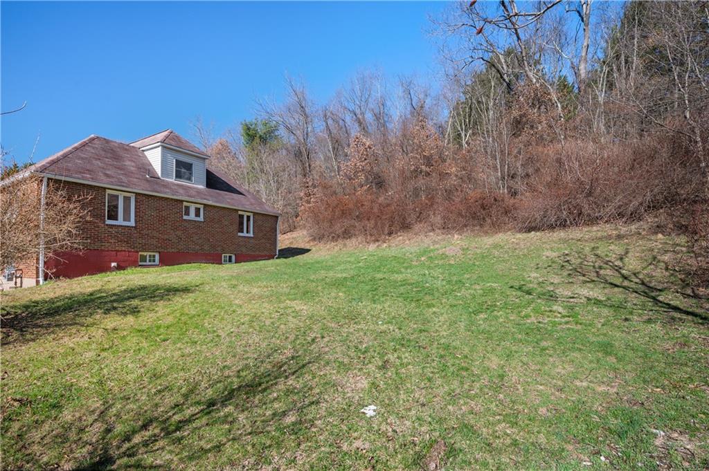 7510 Noblestown Road McDonald, PA 15057 - Photo 16 of 20 a view of a house with a yard