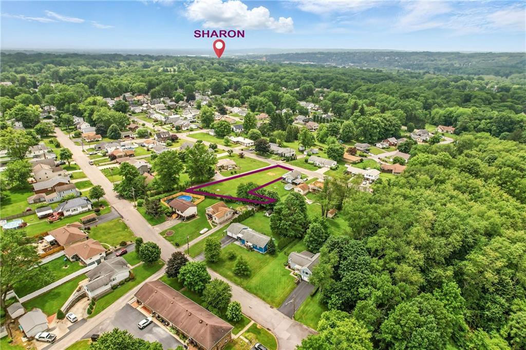 331 South 9th Street Sharpsville, PA 16150 - Photo 12 of 15 an aerial view of residential houses with outdoor space and trees